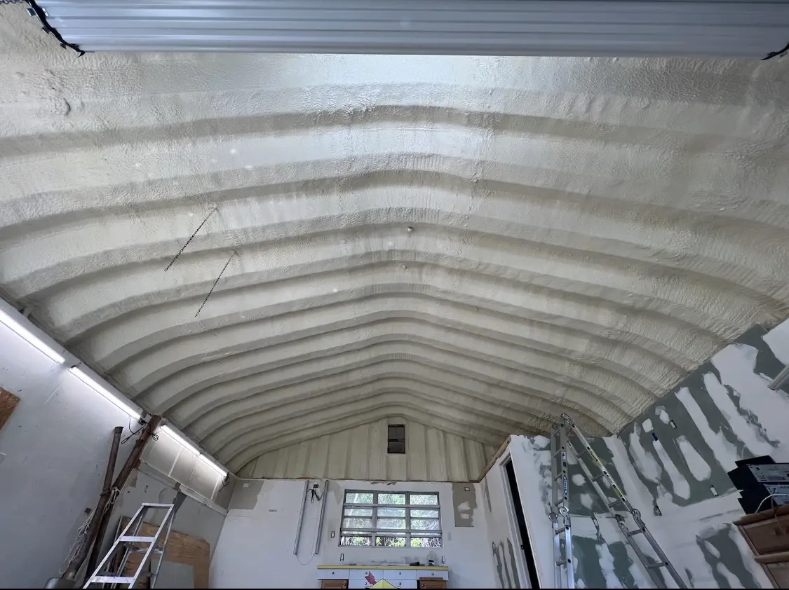 Spray polyurethane foam applied to the underside of a metal roof deck in Matteson